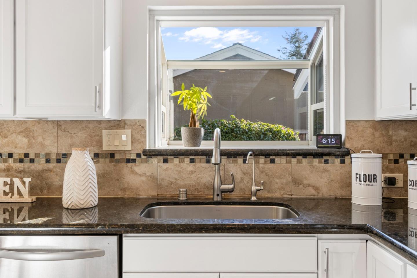 618 Azule Avenue San Jose, CA 95123 - Photo 16 of 48 a kitchen with kitchen island a counter top space and a stove