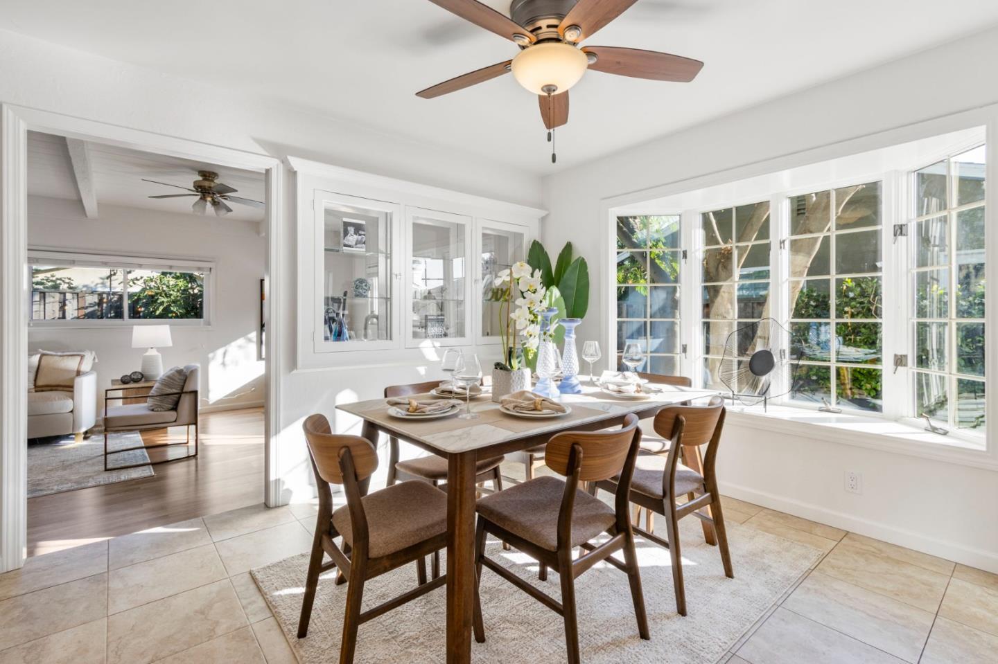 618 Azule Avenue San Jose, CA 95123 - Photo 17 of 48 a view of a dining room and livingroom with furniture wooden floor and a chandelier