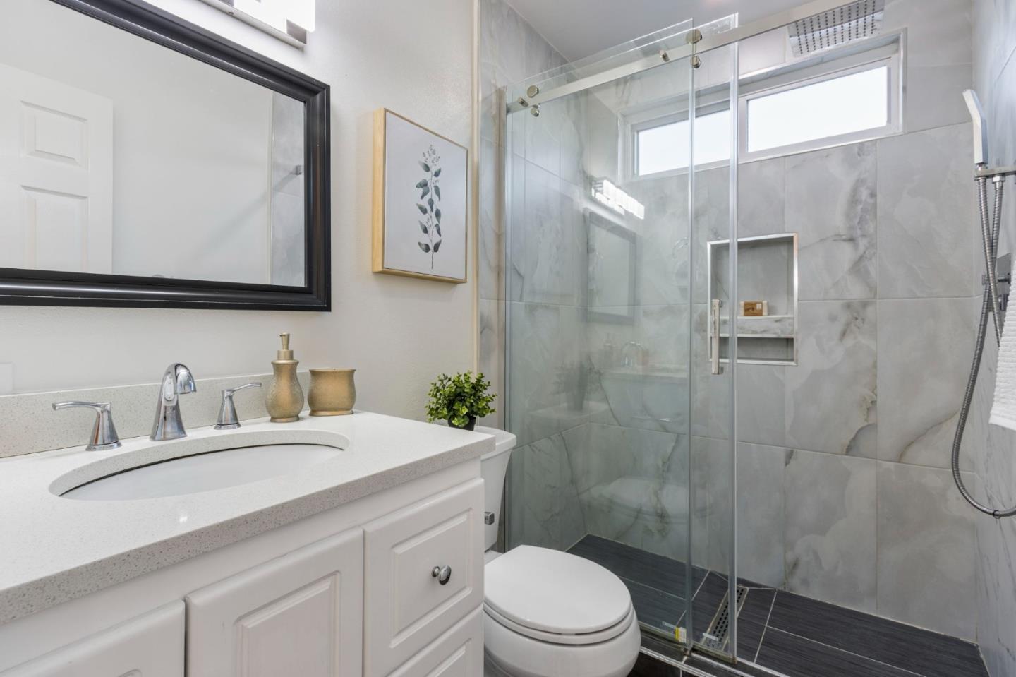 618 Azule Avenue San Jose, CA 95123 - Photo 30 of 48 a bathroom with a sink a toilet and shower
