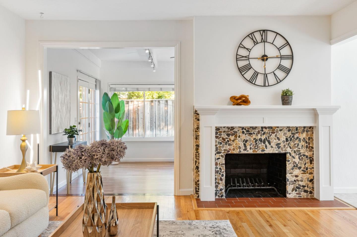 618 Azule Avenue San Jose, CA 95123 - Photo 9 of 48 a living room with furniture a clock and a fireplace