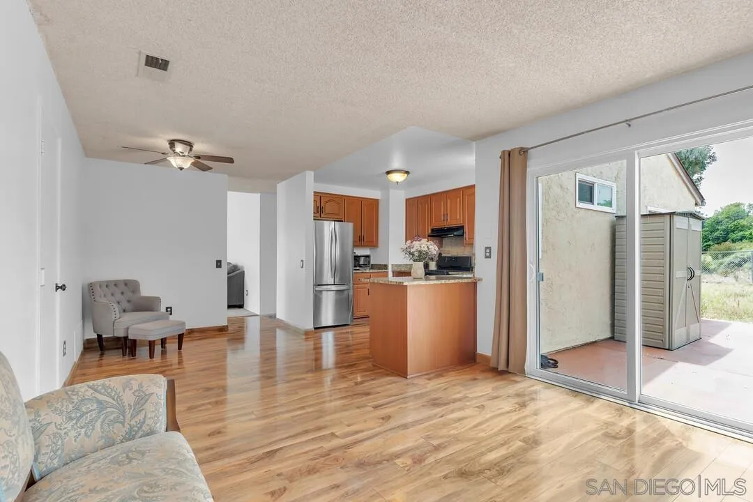 4021 Johnson Drive Oceanside, CA 92056 - Photo 15 of 25 a view of kitchen with furniture and refrigerator