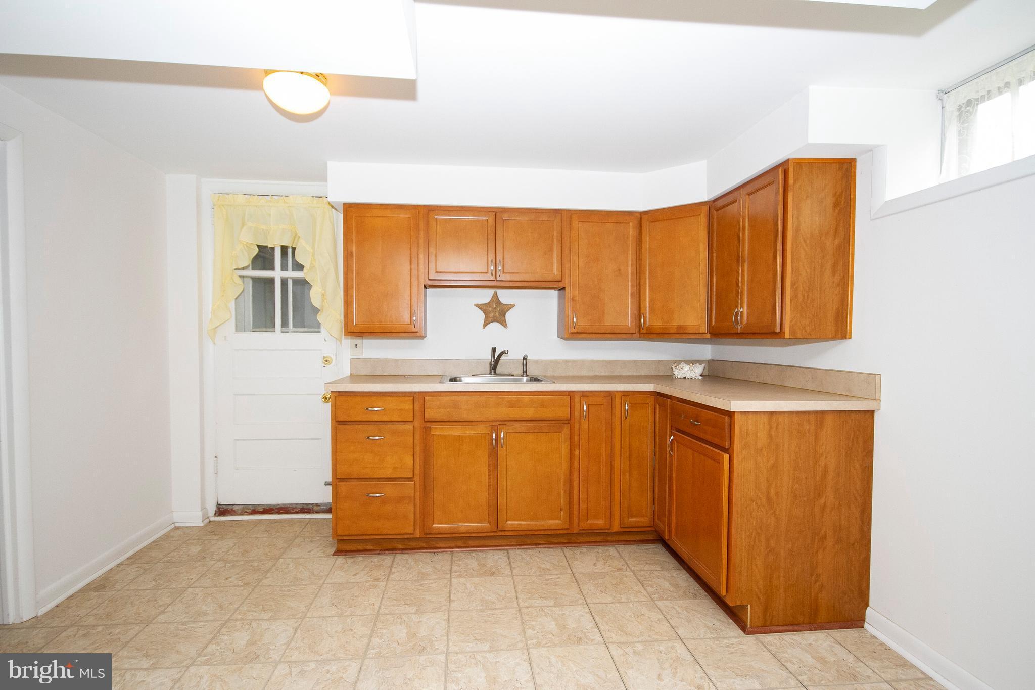 4203 Darleigh Road Baltimore, MD 21236 - Photo 20 of 30 2ND KIT.CHEN AREA ON LOWER LEVEL NEXT TO FAM. RM.
