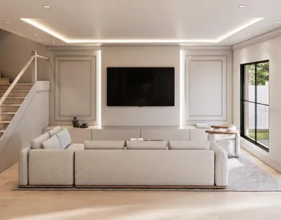 a living room with a couch and a flat screen tv