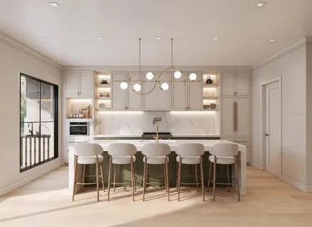 a kitchen with a table and chairs