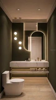 a bathroom with a toilet and a mirror
