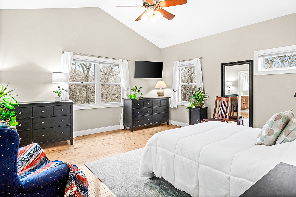 2296 Deer Ridge Court Carlock, IL 61725 - Photo 28 of 59 a bedroom with a bed and flat screen tv