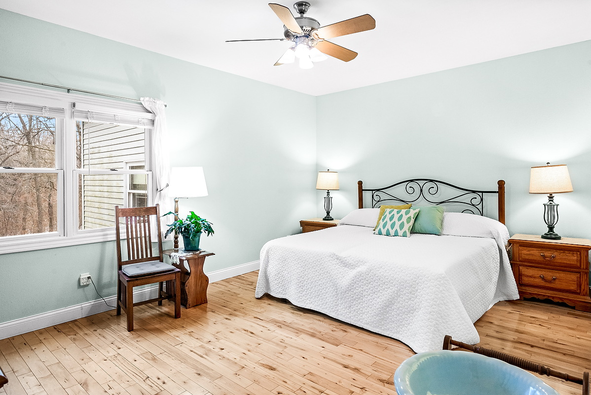 2296 Deer Ridge Court Carlock, IL 61725 - Photo 31 of 59 a bedroom with a bed and window