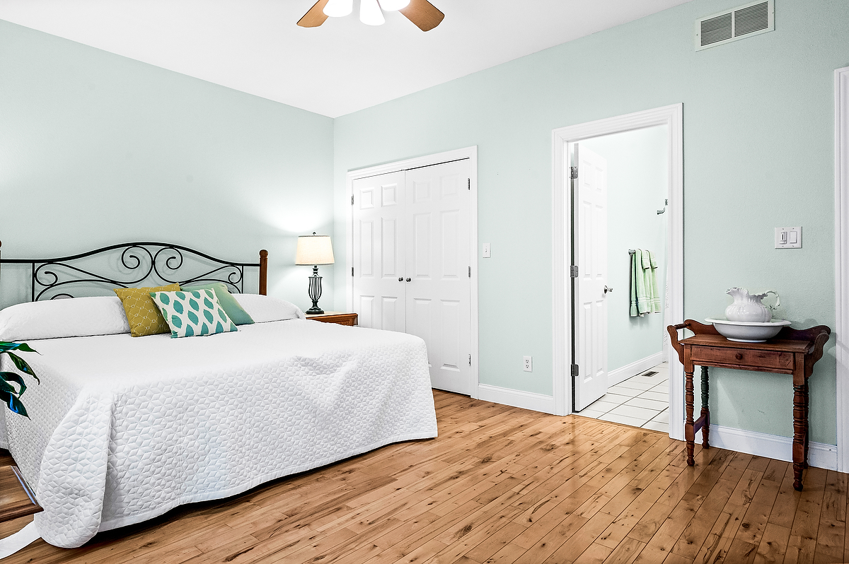 2296 Deer Ridge Court Carlock, IL 61725 - Photo 32 of 59 a bedroom with a bed and a table in it