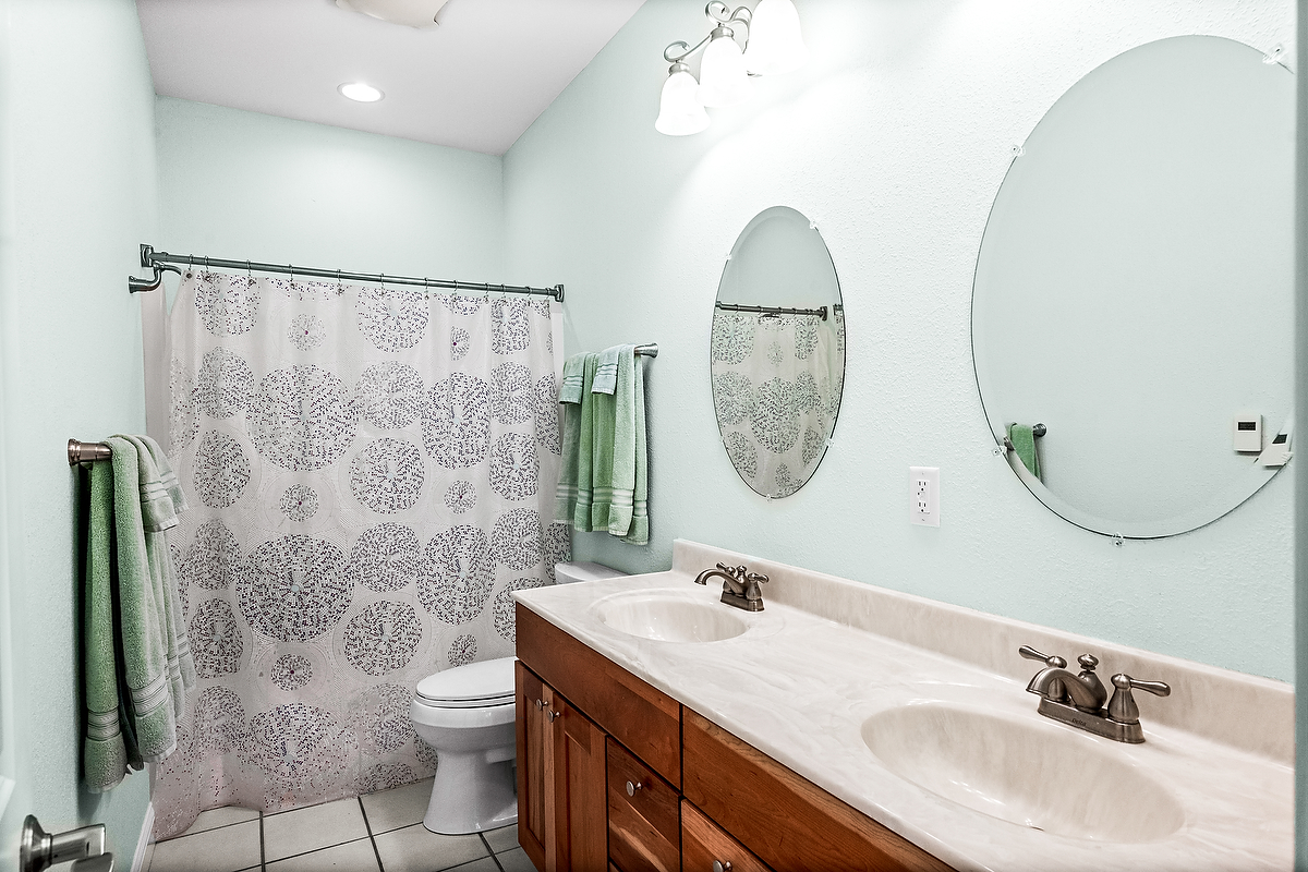 2296 Deer Ridge Court Carlock, IL 61725 - Photo 33 of 59 a bathroom with a sink and a mirror