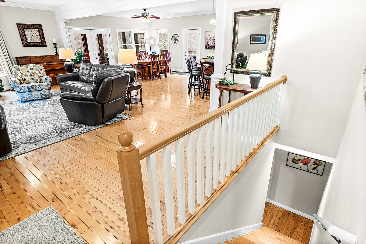 2296 Deer Ridge Court Carlock, IL 61725 - Photo 35 of 59 a living room with furniture and a wooden floor