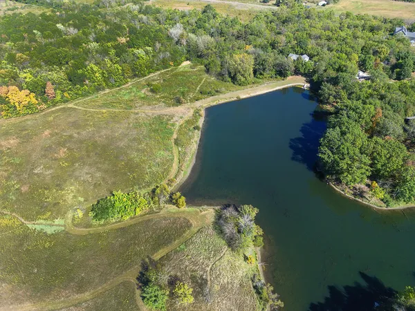 a view of a lake from a yard