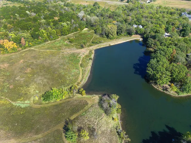 a view of a lake from a yard