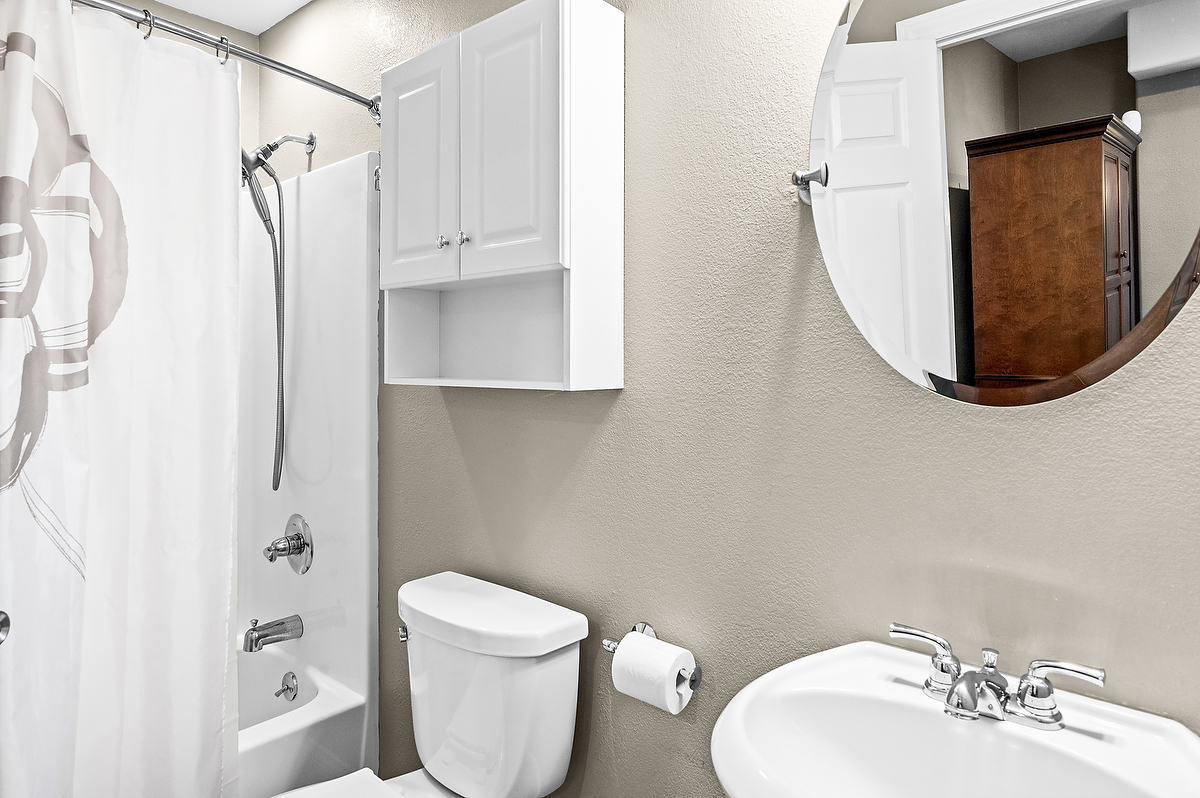 2296 Deer Ridge Court Carlock, IL 61725 - Photo 43 of 59 a bathroom with a toilet sink and mirror