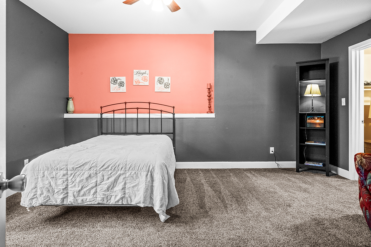 2296 Deer Ridge Court Carlock, IL 61725 - Photo 44 of 59 a bedroom with a bed and a window