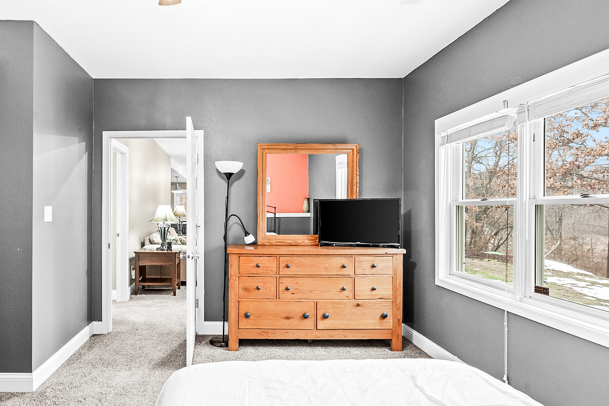 2296 Deer Ridge Court Carlock, IL 61725 - Photo 45 of 59 a living room with furniture and flat tv screen