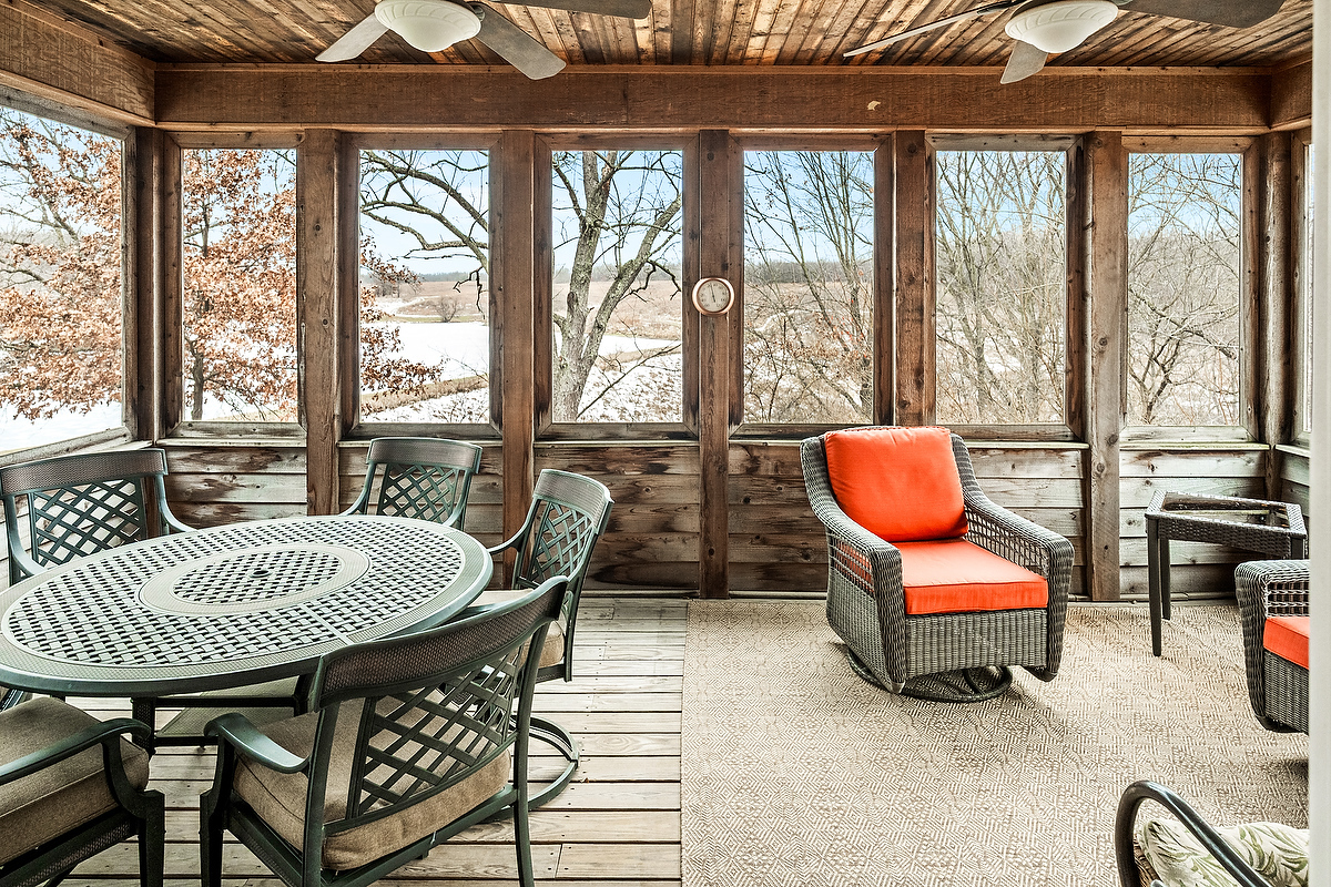 2296 Deer Ridge Court Carlock, IL 61725 - Photo 47 of 59 a dining room with furniture a rug and a large window