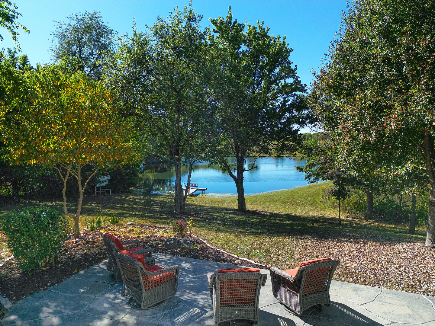 2296 Deer Ridge Court Carlock, IL 61725 - Photo 8 of 59 a view of a yard with swimming pool and sitting area