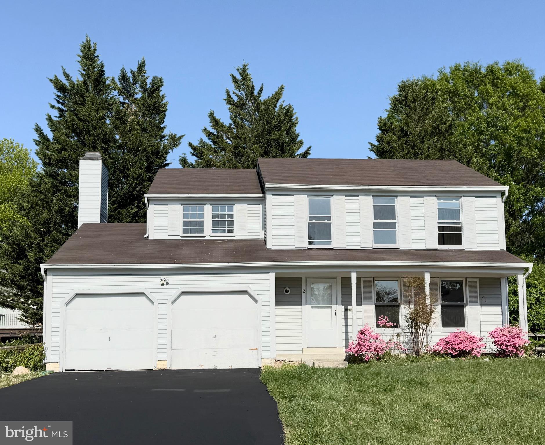 2 Cinnabar Court Gaithersburg, MD 20879 - Photo 1 of 46 a front view of a house with a garage