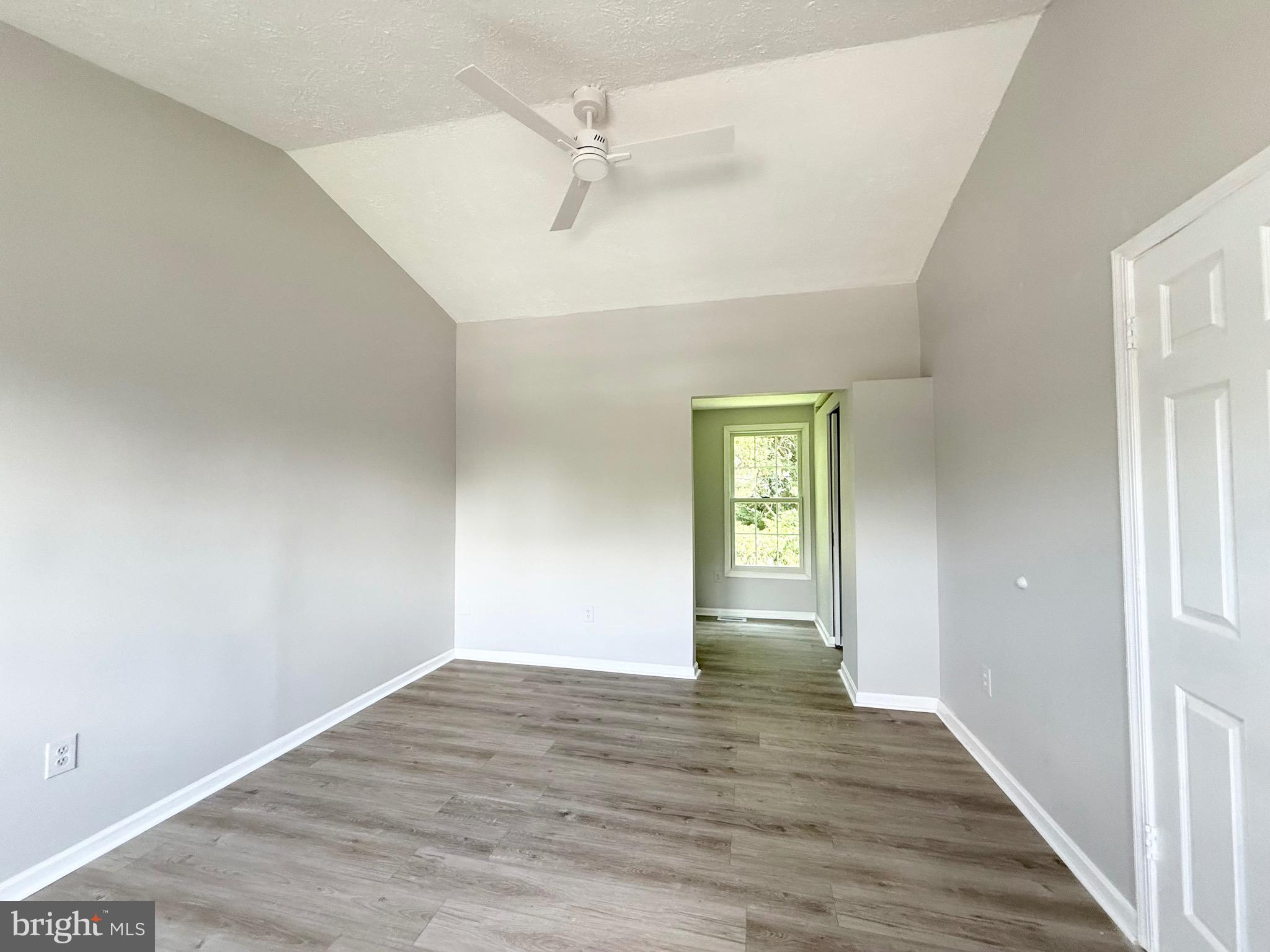 2 Cinnabar Court Gaithersburg, MD 20879 - Photo 19 of 46 a view of an empty room with wooden floor
