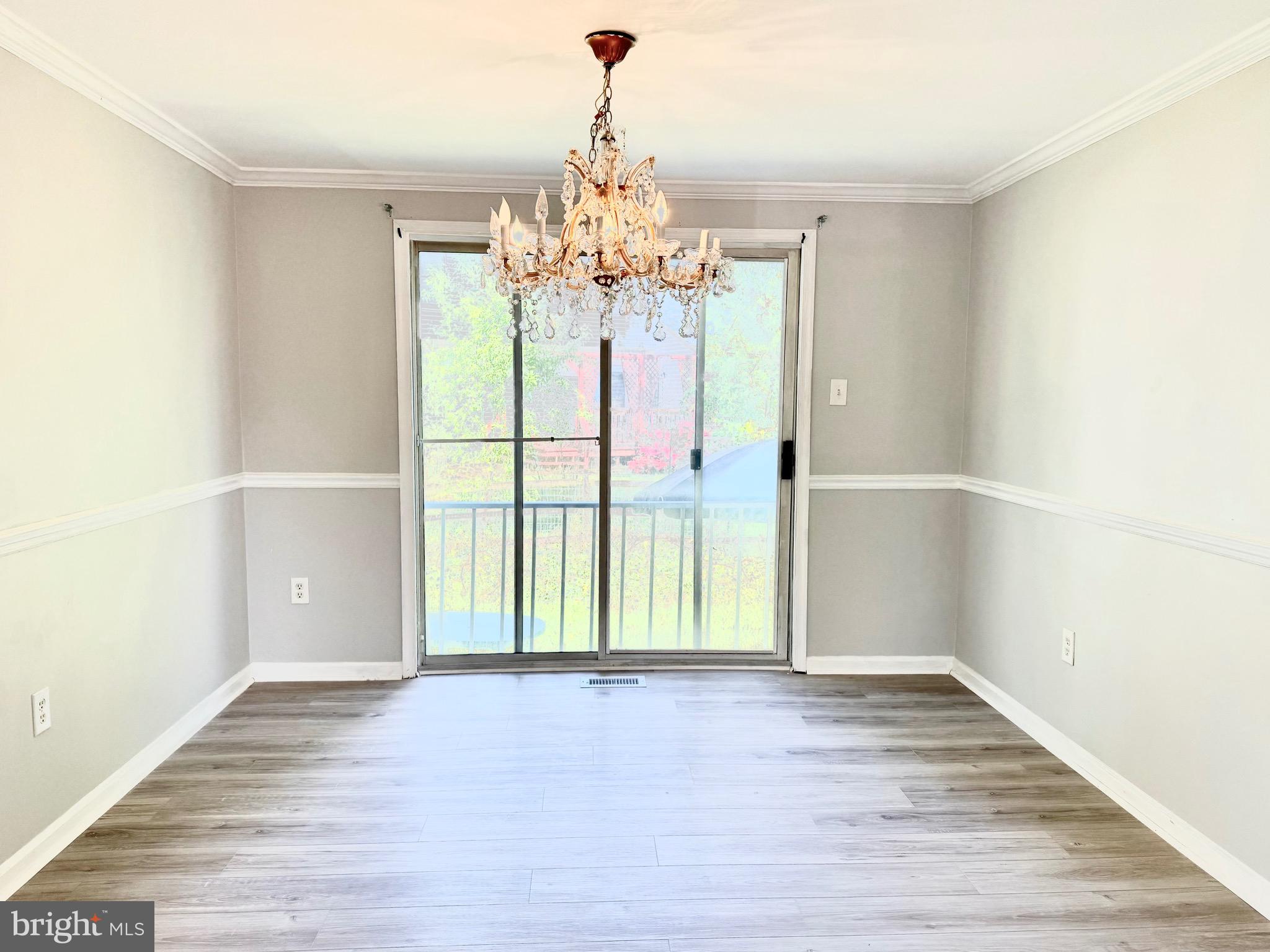 2 Cinnabar Court Gaithersburg, MD 20879 - Photo 3 of 46 a view of an empty room with a window