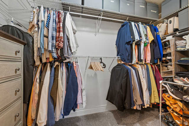 8248 South Resaca Drive, Unit J10 Sandy, UT 84070 - Photo 16 of 40 Custom closet system featuring wire shelving and multiple hanging rods for optimized organization