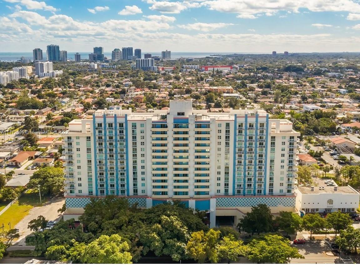 a view of a city with tall buildings