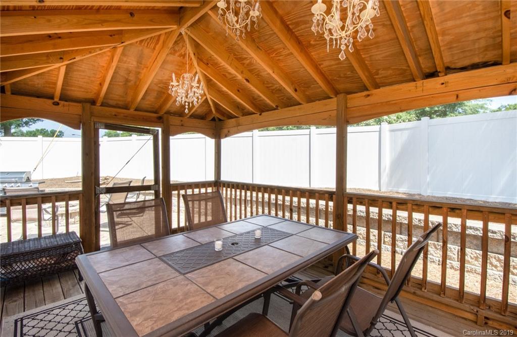 7059 Meyer Road Fort Mill, SC 29715 - Photo 28 of 30 a view of a patio with wooden floor