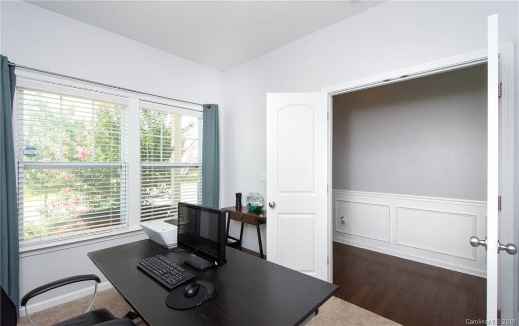 7059 Meyer Road Fort Mill, SC 29715 - Photo 4 of 30 a living room with furniture and a window