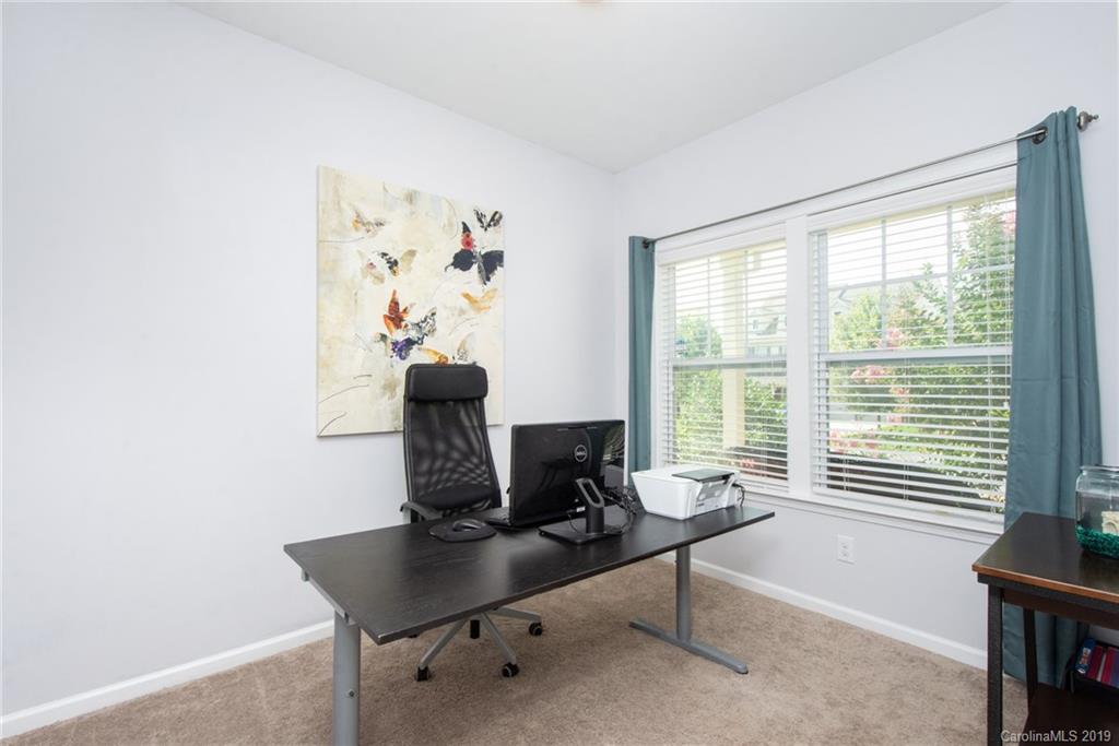 7059 Meyer Road Fort Mill, SC 29715 - Photo 5 of 30 a view of a workspace with furniture