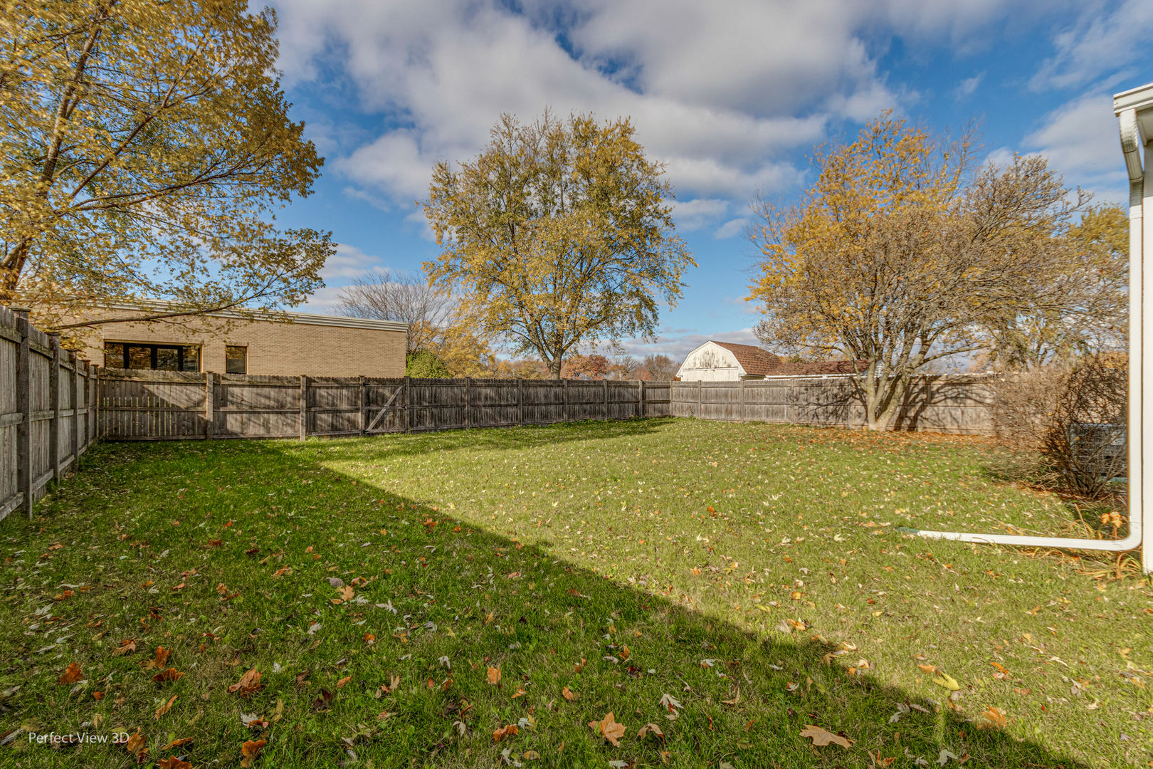 12 Roulock Road Montgomery, IL 60538 - Photo 16 of 17 a view of a yard with a house
