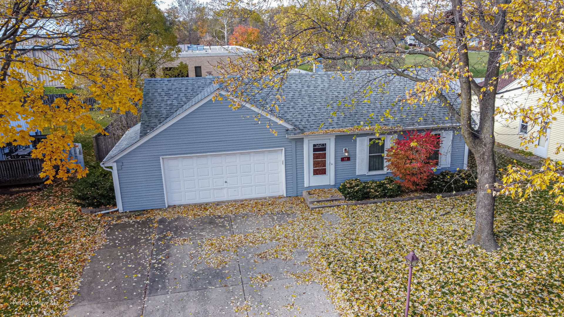 12 Roulock Road Montgomery, IL 60538 - Photo 2 of 17 a front view of a house with a yard