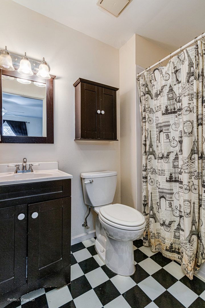 12 Roulock Road Montgomery, IL 60538 - Photo 8 of 17 a bathroom with a sink toilet and shower