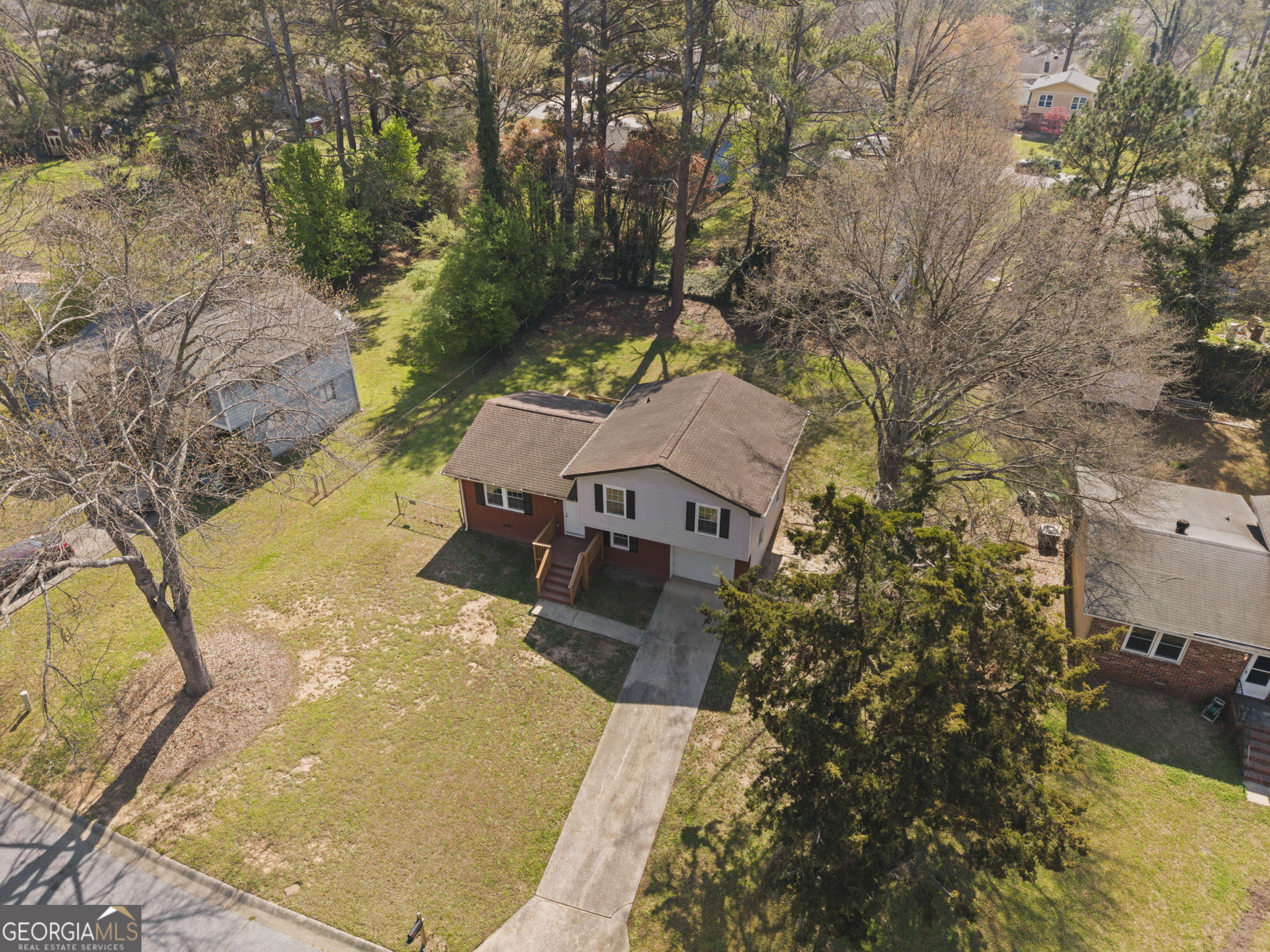 1685 Kinglet Road Jonesboro, GA 30238 - Photo 30 of 34 view of a house with a yard
