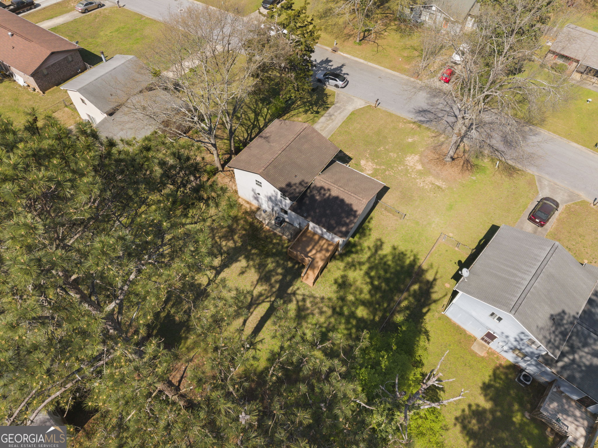 1685 Kinglet Road Jonesboro, GA 30238 - Photo 32 of 34 an aerial view of residential houses with outdoor space