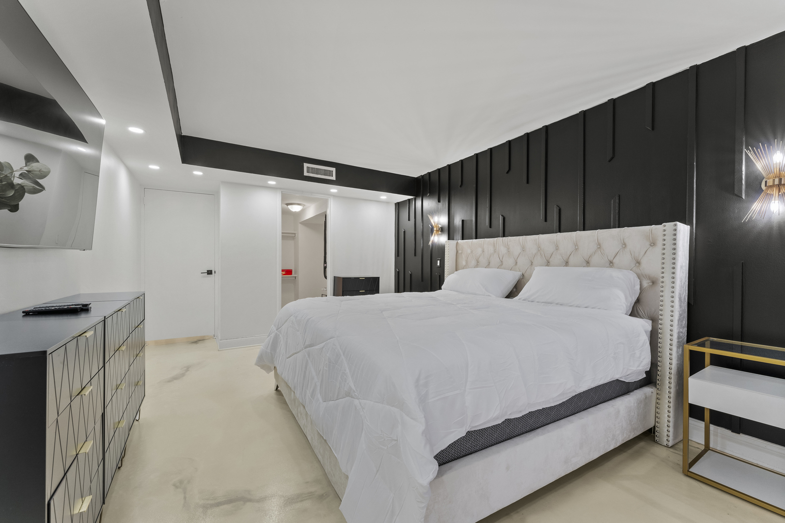 201 East Chestnut Street, Unit 11E Chicago, IL 60611 - Photo 19 of 43 a large white bed in a white room