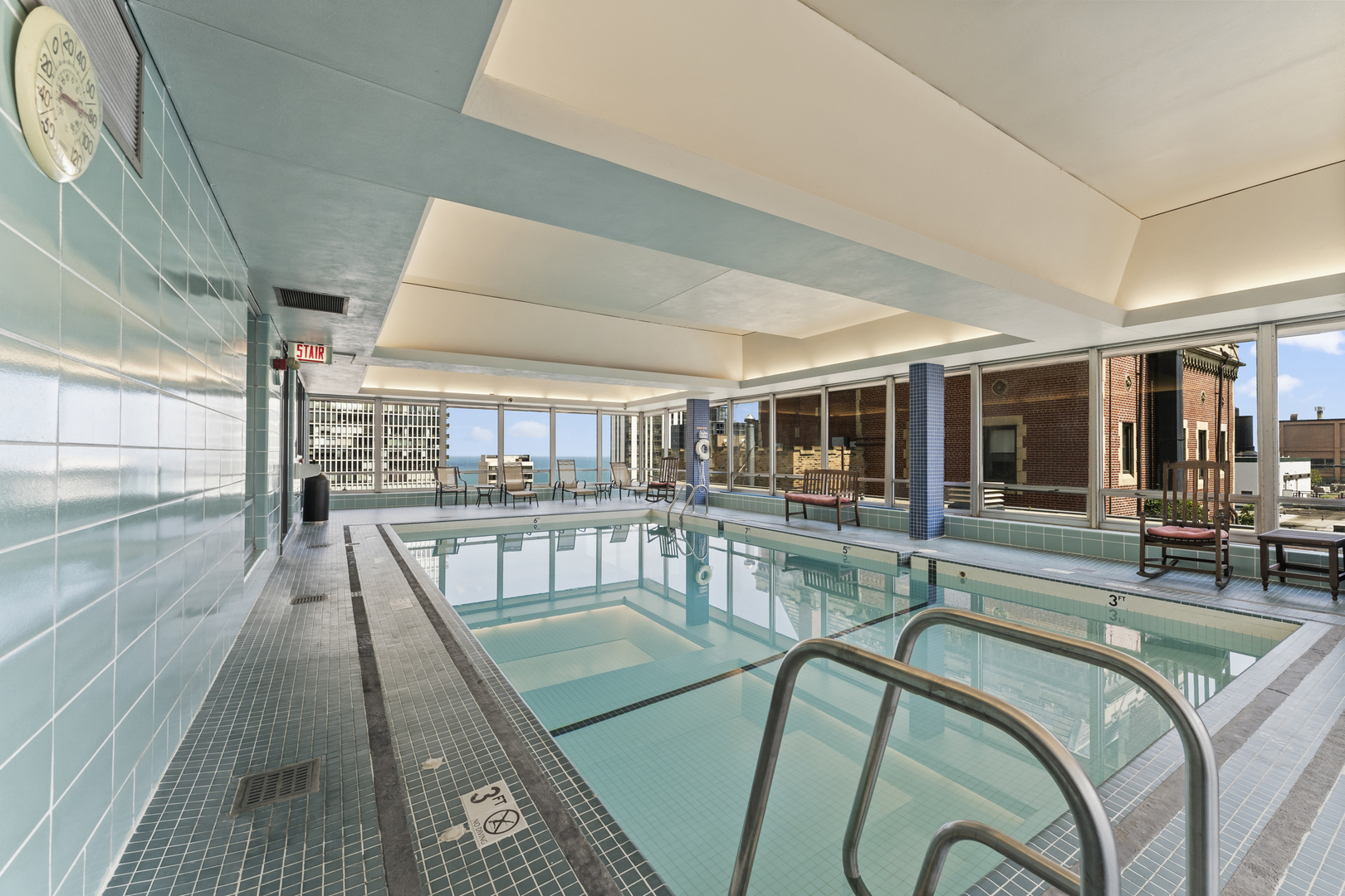 201 East Chestnut Street, Unit 11E Chicago, IL 60611 - Photo 25 of 43 a view of a swimming pool with seating area