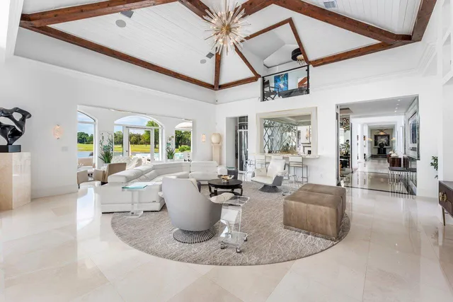 a view of a house with swimming pool and a yard