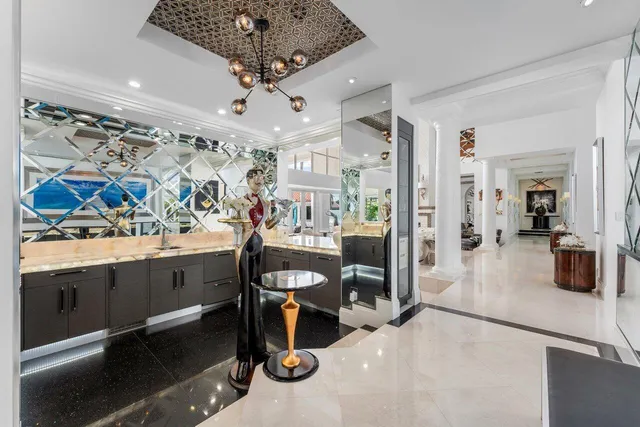 a front view of house with yard and outdoor seating