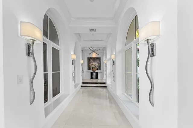 front view of a house with a yard table and chairs