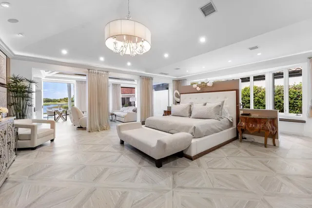 a front view of a house with a garden and swimming pool