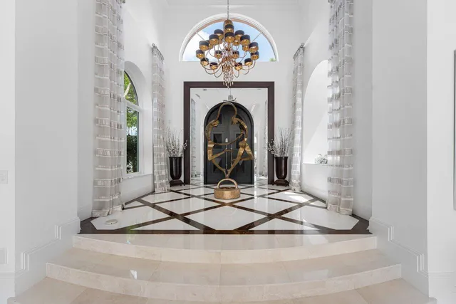 a kitchen with stainless steel appliances granite countertop a stove and cabinets