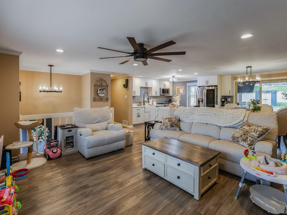 136 Ridgewood Drive Economy, PA 15042 - Photo 17 of 17 a living room with furniture and a wooden floor