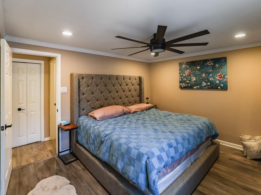 136 Ridgewood Drive Economy, PA 15042 - Photo 10 of 17 a bedroom with a bed and a chandelier