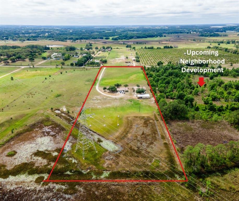 a view of a city with an ocean view