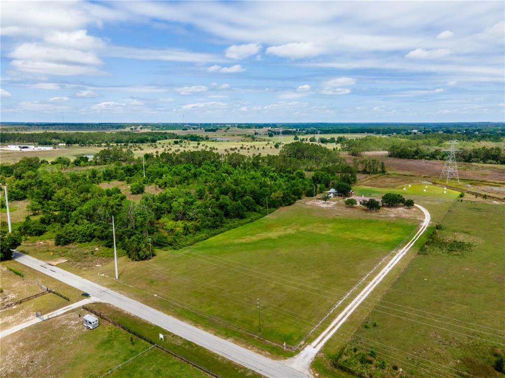 22111 Obrien Road Howey-in-the-Hills, FL 34737 - Photo 2 of 7 a view of a tennis court
