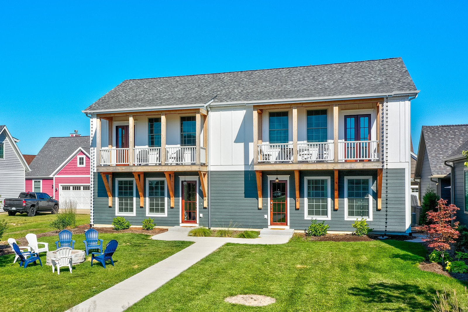 8 Port Place Ottawa, IL 61350 - Photo 2 of 32 a front view of a house with a yard table and chairs