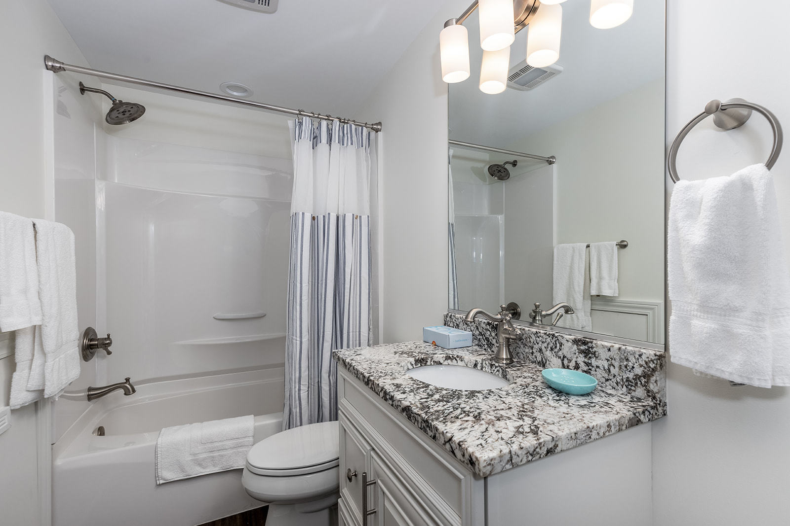 8 Port Place Ottawa, IL 61350 - Photo 28 of 32 a bathroom with a granite countertop sink toilet and shower