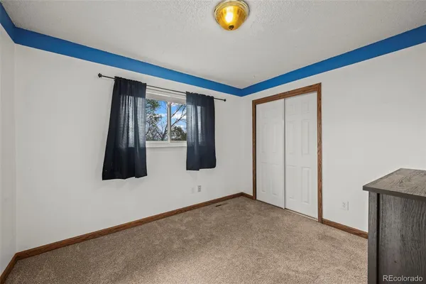 a view of a livingroom with a flat screen tv