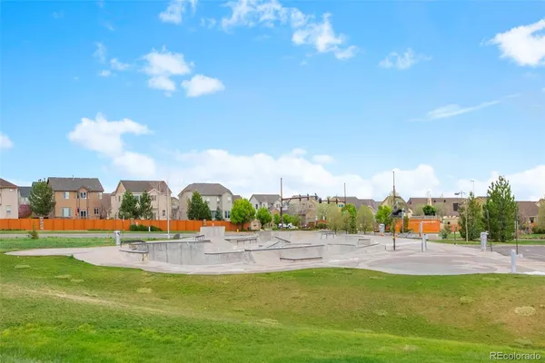 a view of a swimming pool with a lawn chairs