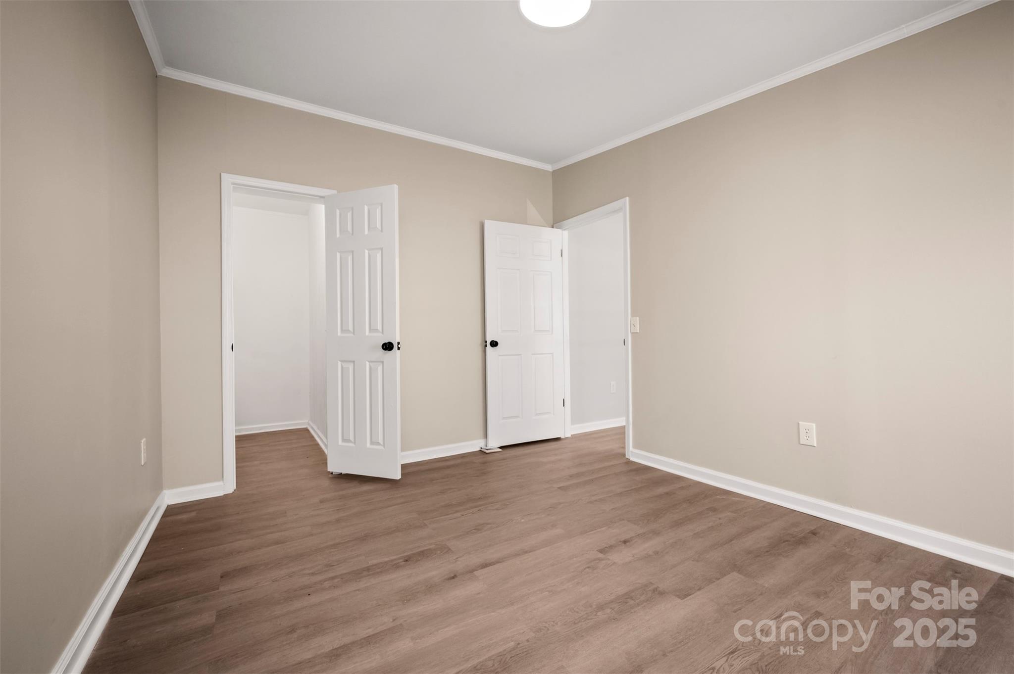 3114 Bostic Sunshine Highway Bostic, NC 28018 - Photo 12 of 48 a view of an empty room with wooden floor